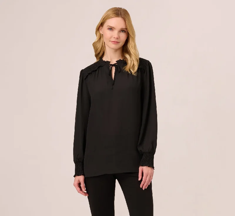 Ruffle Tie Neck Top With Smocked Long Sleeves In Black